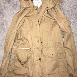 tan zip up fashionable jacket.